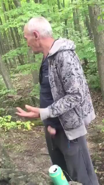 Click to play video Old man pissing in the woods
