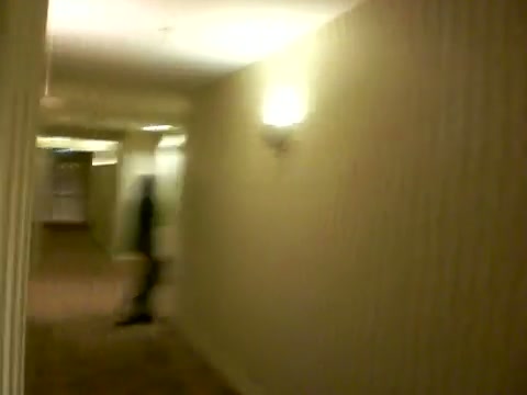 Click to play video Drunk Girl Hotel Corridor