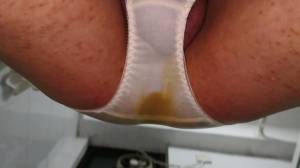 Click to play video This lovely yollow pure panty was pee and poop already!!!IIt become brown!!