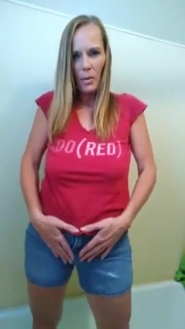Click to play video Hot MILF pissing her pants
