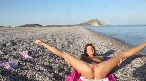 Click to play video Bronzed girl piss fountain on the beach