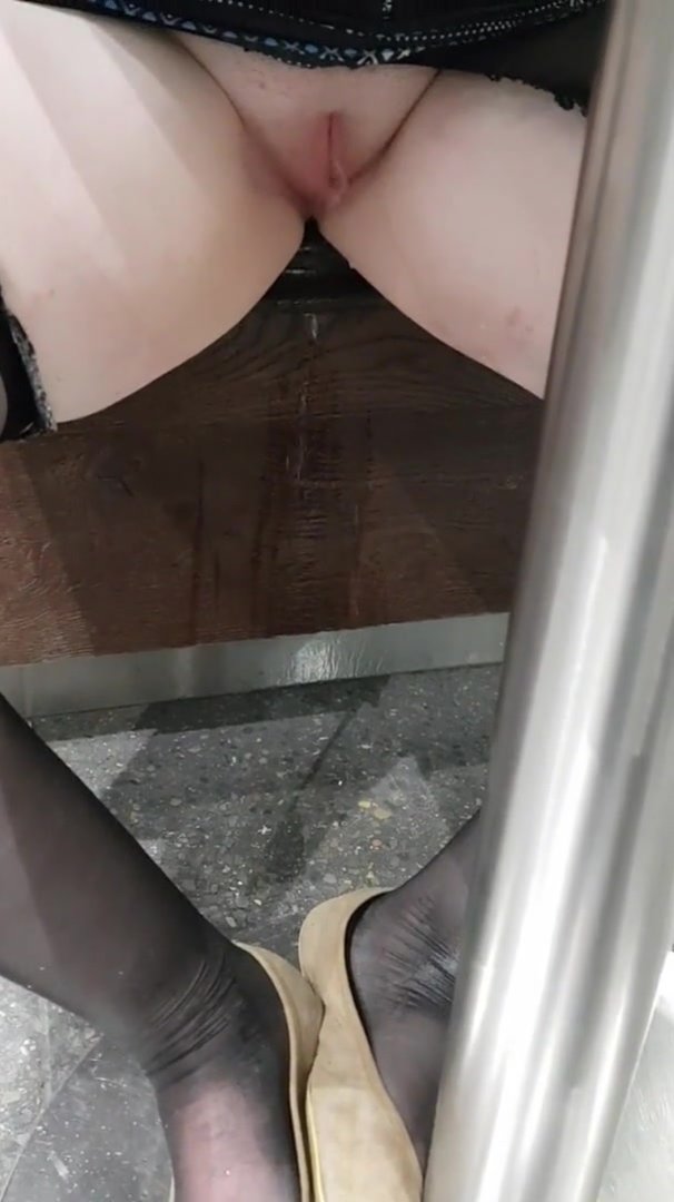 Click to play video Peeing Under table a Restaurant