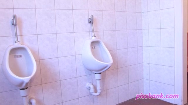 Click to play video Girl pees on the floor in gents'
