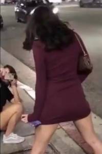 Click to play video Girls pissing in public - video 2