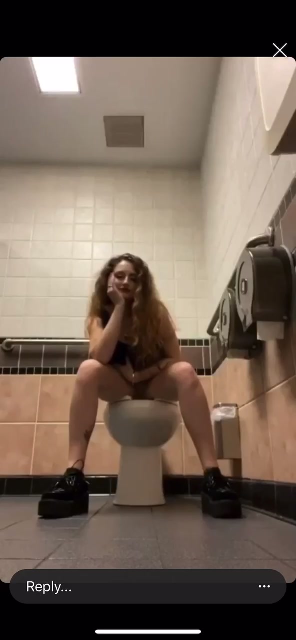 Click to play video White girl peeing in public bathroom