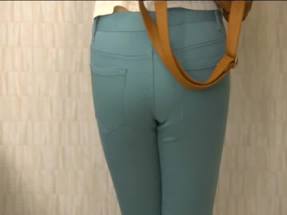 Click to play video Wets her tight blue pants