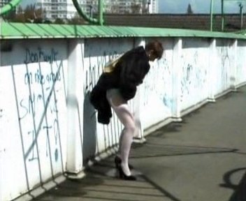 Click to play video Mature lady pees on the street without taking off the panties - pissing porn at ThisVid tube