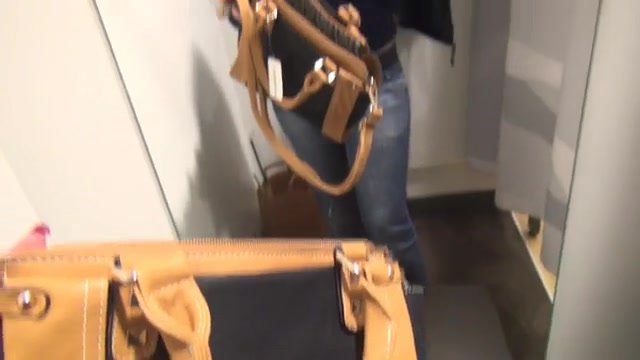 Click to play video German girl peeing into a purse in changing room - pissing porn at ThisVid tube