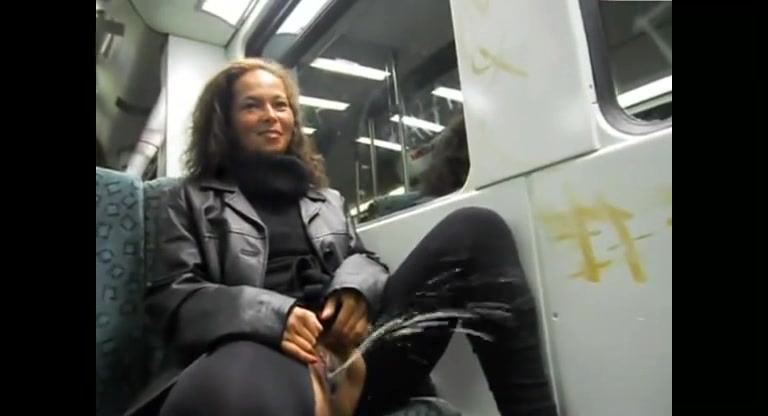 Click to play video Crazy brunette piss in the train