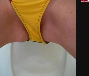 Click to play video Pissing in yellow bikini (colours are from german flag)