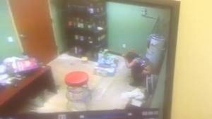 Click to play video Girl peeing on a store room floor