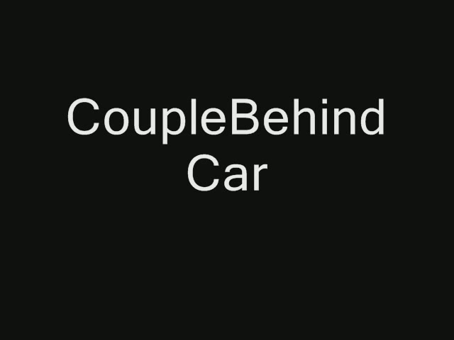 Click to play video Couple behind car