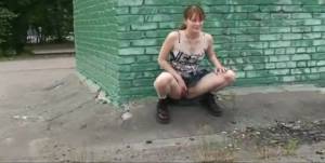 Click to play video Russian girl pisses outside