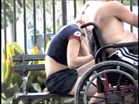 Click to play video Disabled and carer pee in park