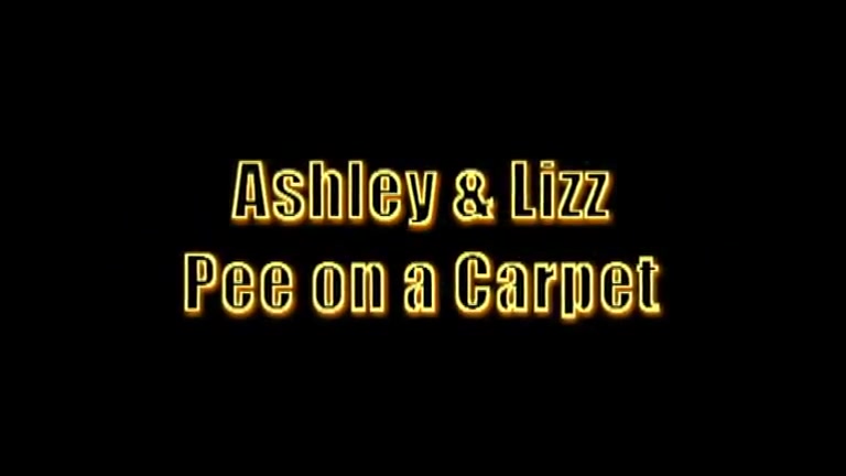 Click to play video Ashley and Lizz pissing on the carpet