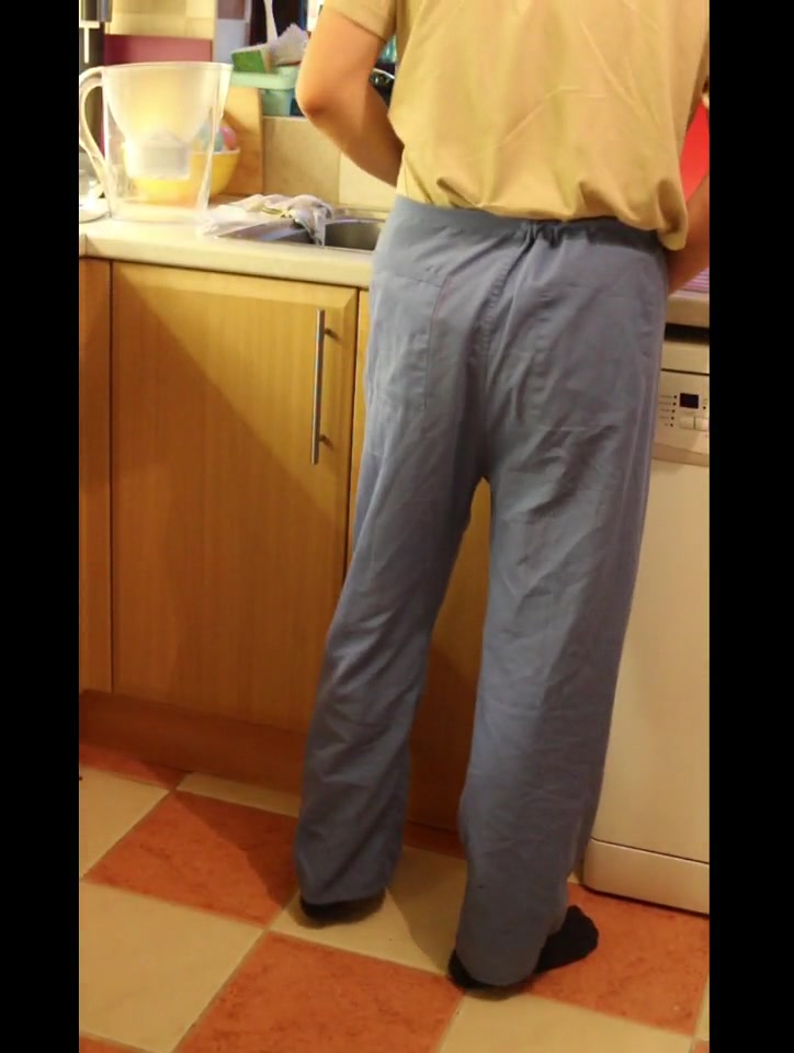 Click to play video (m)aking a pee mess while doing the dishes